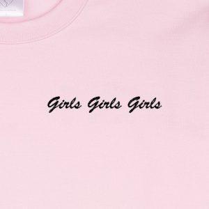 "Girls Girls Girls" embroidered in noir thread on a pale-pink sweatshirt: front-on close-up