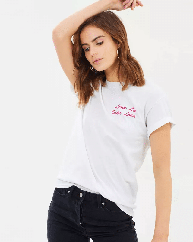 White tee embroidered Livin La Vida Loca in pink